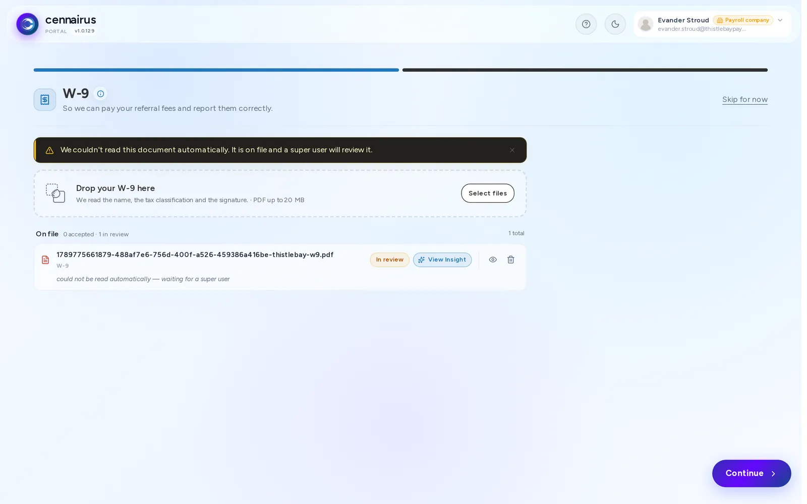 The W-9 step, with the form on file and waiting for review.