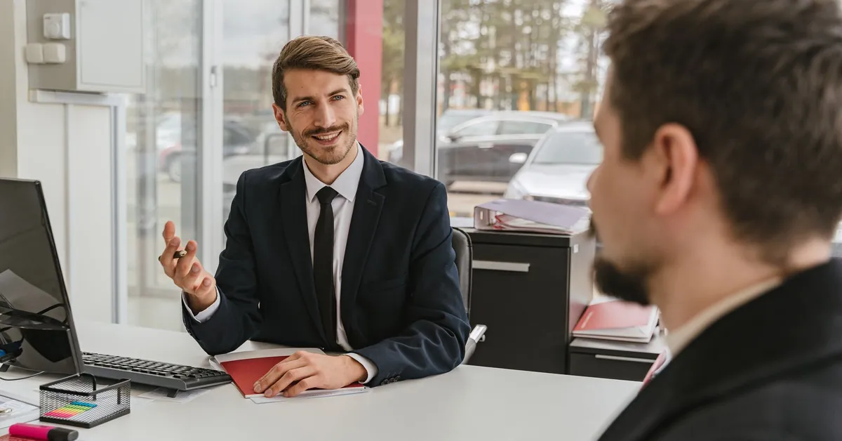 Two businessmen having a conversation in a modern office setting. businessman talking with client
